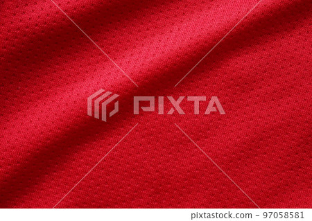 Red sports clothing fabric football shirt jersey texture close up 97058581