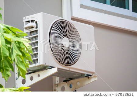 Air conditioner compressor outdoor unit installed outside the house Air conditioner compressor outdoor unit installed outside the house 97058621