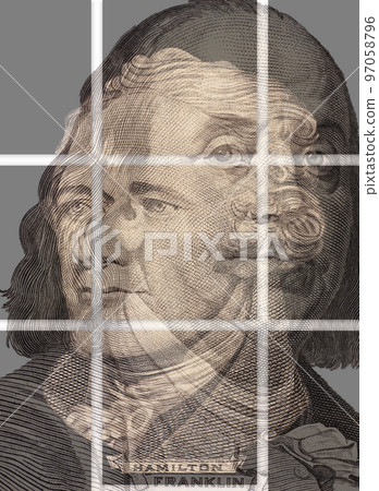 Double exposure of portrait of U.S. presidents Benjamin Franklin and Alexander Hamilton. 97058796