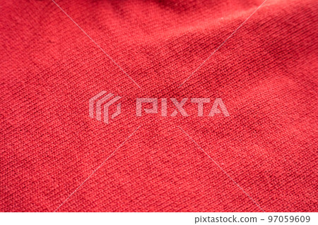 closeup red knitted woolen fabric texture background 97059609