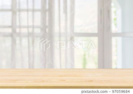 Empty wood table top with window curtain abstract blur background for product display 97059684