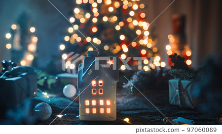 The little house with candle and tree as background 97060089