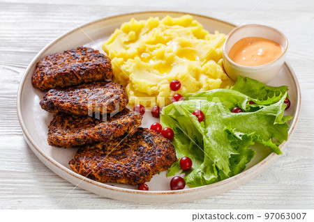 fried minced liver patties with potato mash fried minced liver patties with potato mash 97063007