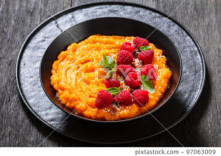 Sweet Potato Mash topped with fresh Raspberries 97063009