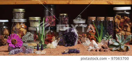 Amethyst Crystals and Chakra Stones on Australian Red Sand. Meditation Table 97063700
