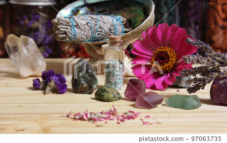 Dried Flowers and Crystal Stones on Meditation Altar Shallow DOF Dried Flowers and Crystal Stones on Meditation Altar Shallow DOF 97063735