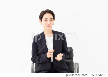 woman being interviewed 97065656
