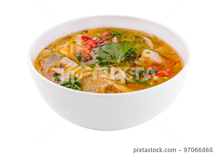 chicken noodle soup in a white ceramic bowl isolated on white chicken noodle soup in a white ceramic bowl isolated on white 97066868