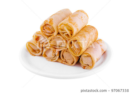 Stack of crepes rolls twisted with meat 97067338