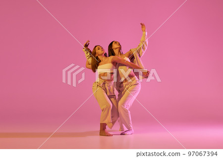 Modern dance art. Young girls, couple of - Stock Photo [97067394] - PIXTA