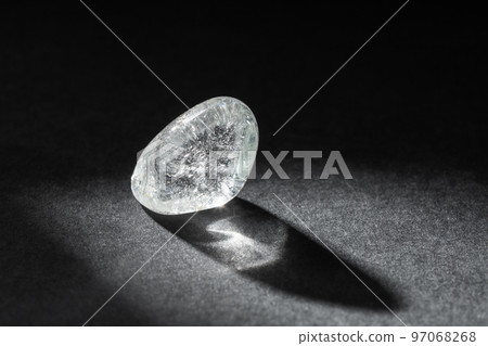 Blue Topaz Mineral Stone on Dark Background 97068268