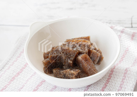 Frozen konjac with seasoning in a bowl 97069491