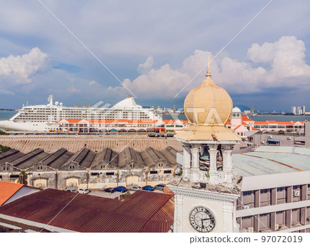 Young woman feeding an African Sacred ibis 97072019
