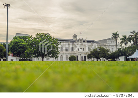 Young woman feeding an African Sacred ibis 97072043