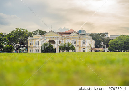 Young woman feeding an African Sacred ibis Young woman feeding an African Sacred ibis 97072044