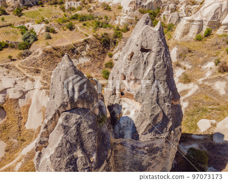 Unique geological formations in Love Valley in Cappadocia, popular travel destination in Turkey 97073173