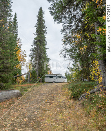 camping caravan near river autumn fall landscape along Ammarnas National Park in Lapland Sweden camping caravan near river autumn fall landscape along Ammarnas National Park in Lapland Sweden 97073471