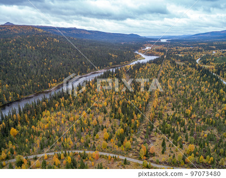 aerial view camping caravan near river autumn fall landscape along Ammarnas National Park in Lapland Sweden aerial view camping caravan near river autumn fall landscape along Ammarnas National Park in Lapland Sweden 97073480