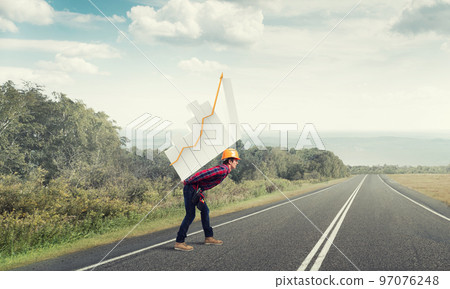 Engineer man carry progress graph Engineer man carry progress graph 97076248