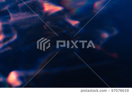colorful warm pink rainbow light leaks on black background 97076638