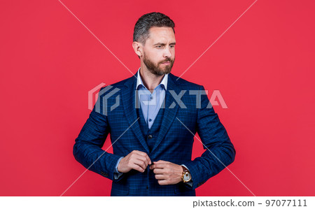 mature successful man businessman in businesslike suit has grizzled hair, business fashion 97077111
