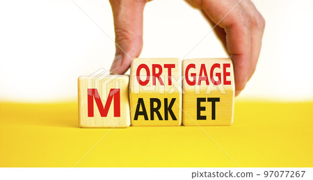 Mortgage market symbol. Concept words Mortgage market on wooden cubes. Beautiful yellow table white background. Businessman hand. Business mortgage market concept. Copy space. Mortgage market symbol. Concept words Mortgage market on wooden cubes. Beautiful yellow table white background. Businessman hand. Business mortgage market concept. Copy space. 97077267