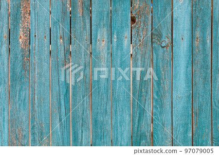 Old wooden fence with faded green paint texture. 97079005