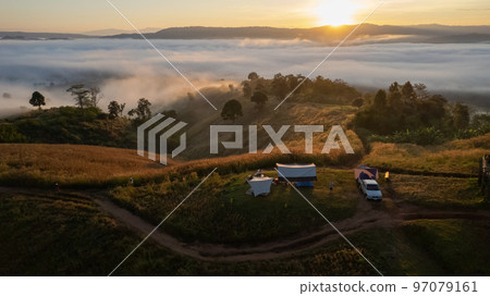 Aerial view camping on the mountain and fog landscape at Loei province Thailand Aerial view camping on the mountain and fog landscape at Loei province Thailand 97079161