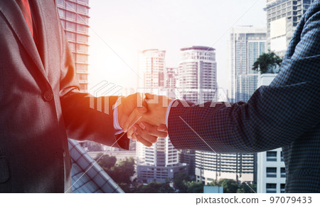 Close-up of the handshake of businessmen. 97079433