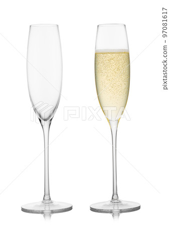 Yellow golden full and empty champagne glasses on white. 97081617