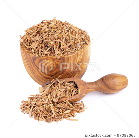 Catuaba bark in wooden bowl, isolated on white background. Trichilia catigua bark. Chuchuhuasha, Tatuaba, Pau de Reposta, Piratancara and Caramuru. Catuaba bark in wooden bowl, isolated on white background. Trichilia catigua bark. Chuchuhuasha, Tatuaba, Pau de Reposta, Piratancara and Caramuru. 97082065