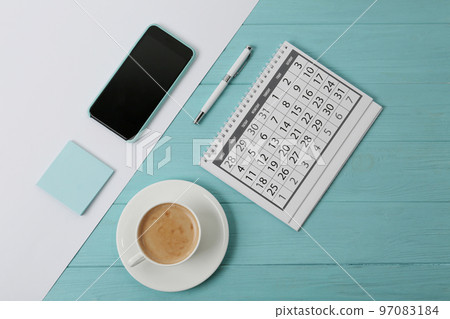 Flat lay composition with calendar on color background Flat lay composition with calendar on color background 97083184