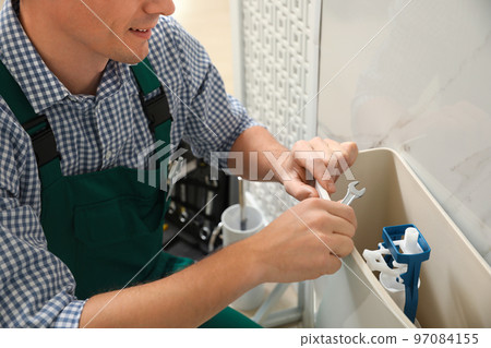 Woman with feather showing smooth skin after bikini epilation on pink background 97084155