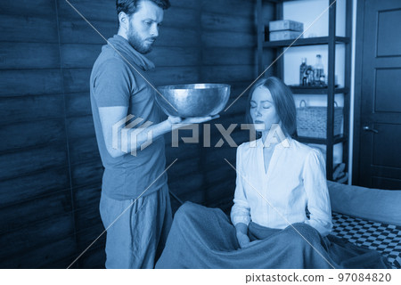 Tibetan singing bowls in sound therapy in spa center 97084820
