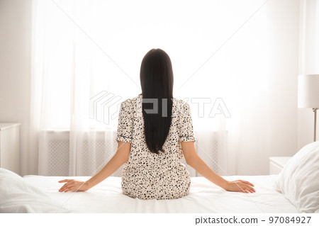 Young woman awakening at home. Lazy morning 97084927