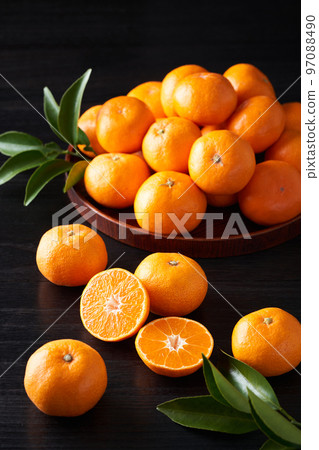 Mandarin oranges cut in half Mandarin oranges cut in half 97088490