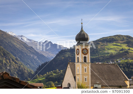 Idyllic landscape of church in Engadine valley, Swiss Alps, Switzerland Idyllic landscape of church in Engadine valley, Swiss Alps, Switzerland 97091300