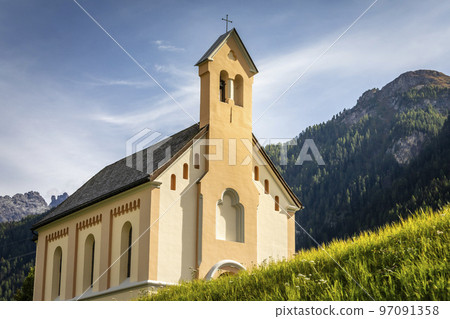 Idyllic landscape of Ardez church, Engadine, Swiss Alps, Switzerland Idyllic landscape of Ardez church, Engadine, Swiss Alps, Switzerland 97091358