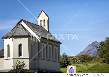 Idyllic landscape of Ardez church, Engadine, Swiss Alps, Switzerland Idyllic landscape of Ardez church, Engadine, Swiss Alps, Switzerland 97091426