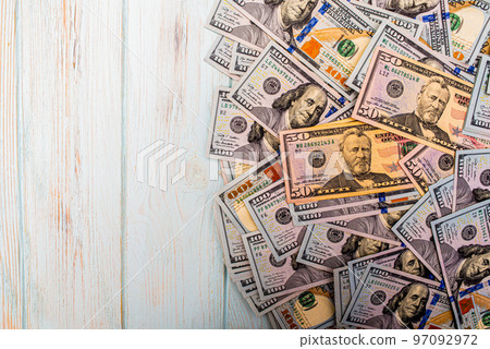 American dollars as a background. Finance and banks. The growth of the dollar. 97092972