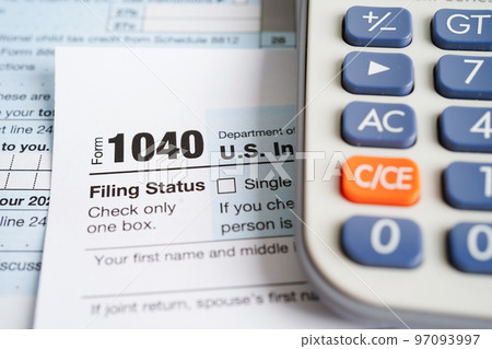 Tax form 1040 U.S. Individual Income Tax Return, business finance concept. Tax form 1040 U.S. Individual Income Tax Return, business finance concept. 97093997