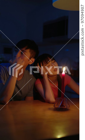 asian couple with power outage asian couple with power outage 97094987