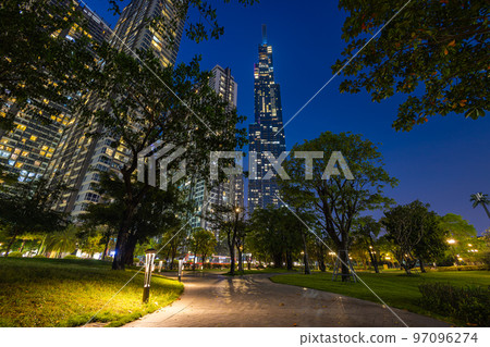 Ho Chi Minh City, Vietnam - November 08, 2022: Night view to the Saigon icon, the landmark 81. The sunset falls at landmark 81, the tallest building in Vietnam. View from central park to the new tower 97096274