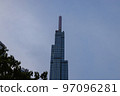 Ho Chi Minh City, Vietnam - November 08, 2022: Night view to the Saigon icon, the landmark 81. The sunset falls at landmark 81, the tallest building in Vietnam. View from central park to the new tower 97096281