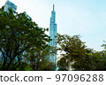 Ho Chi Minh City, Vietnam - November 08, 2022: Night view to the Saigon icon, the landmark 81. The sunset falls at landmark 81, the tallest building in Vietnam. View from central park to the new tower 97096288