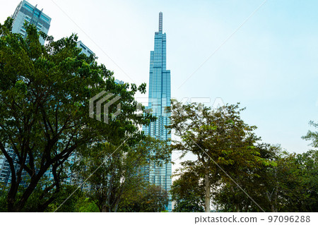 Ho Chi Minh City, Vietnam - November 08, 2022: Night view to the Saigon icon, the landmark 81. The sunset falls at landmark 81, the tallest building in Vietnam. View from central park to the new tower 97096288