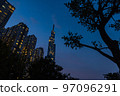 Ho Chi Minh City, Vietnam - November 08, 2022: Night view to the Saigon icon, the landmark 81. The sunset falls at landmark 81, the tallest building in Vietnam. View from central park to the new tower 97096291