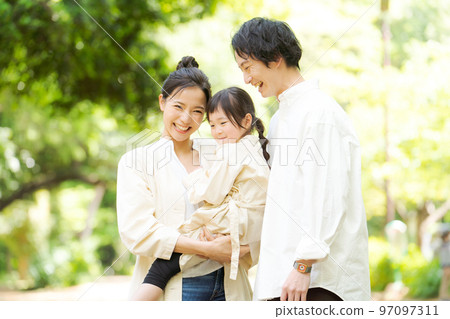 Families playing in the park 97097311