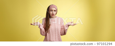 What big deal, why so fuss. Frustrated confused and clueless cute young pretty woman in knitted sweater, headband shrugging in dismay asking question unaware what happening What big deal, why so fuss. Frustrated confused and clueless cute young pretty woman in knitted sweater, headband shrugging in dismay asking question unaware what happening 97101294