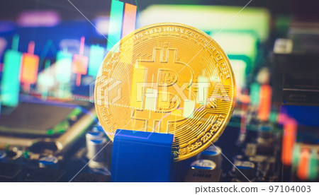 Cryptocurrency concept , Golden bitcoin on winners cup background mainboard , The future of money. Computational equipment. Cryptocurrency concept , Golden bitcoin on winners cup background mainboard , The future of money. Computational equipment. 97104003